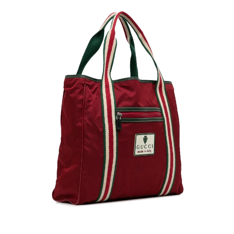 Women Gucci Sylvie bags with a crystal - embellished web stripeGucci GG Nylon Crest Sherry Line Web Tote (Bio25q)