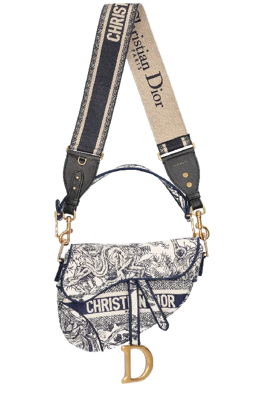 Christian Dior Saddle bags with a patent leather finish for a shiny lookCHRISTIAN DIOR Saddle Bag Toile de Jouy