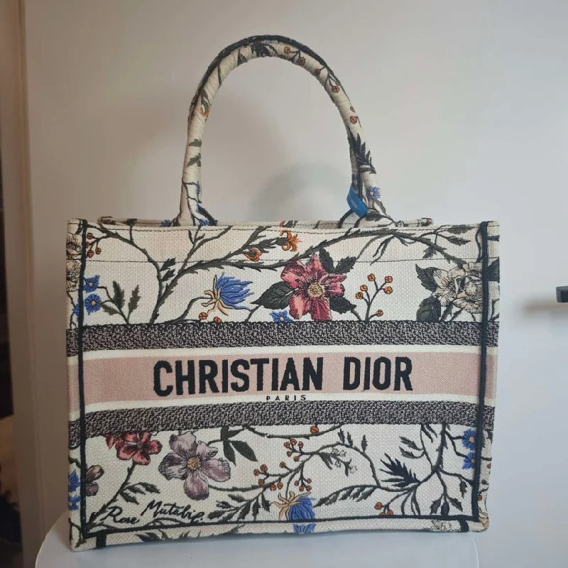 Christian Dior bags with a side - pocket for holding a water bottleChristian Dior Book Tote Multicolor Embroidered Floral Canvas Large